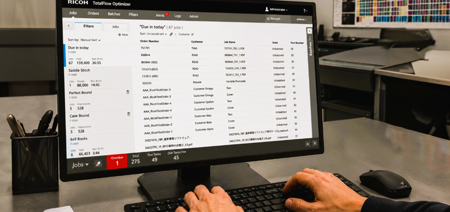 RICOH TotalFlow™ Optimizer dashboard showing print job management on a desktop computer